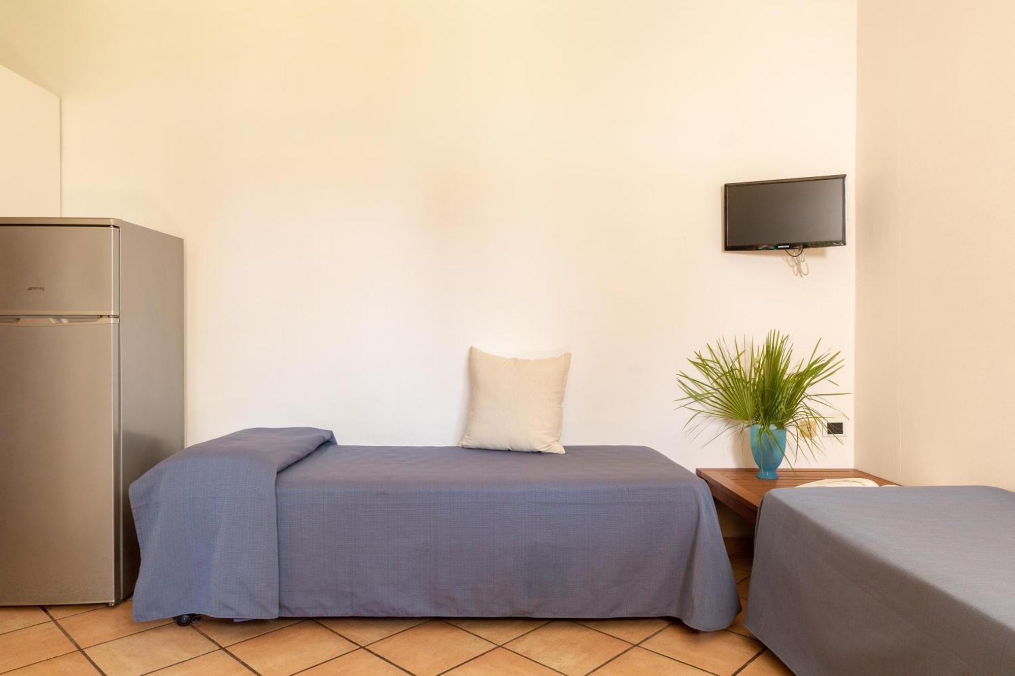 Argentario Camping Village Albinia Esterno foto A typical room at the hostel